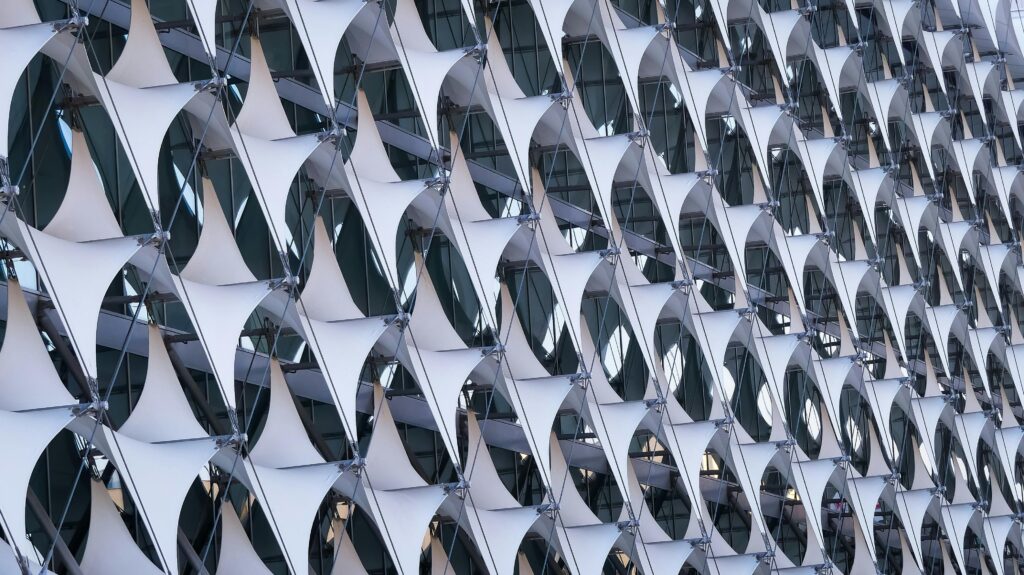A close-up view of a modern architectural facade with abstract design in Saudi Arabia.